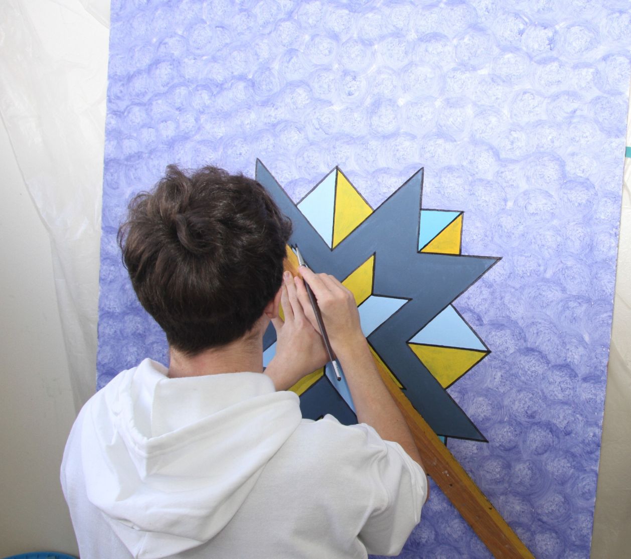 Lernender am Filet ziehen